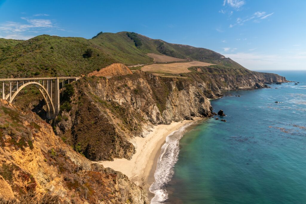 Aerial view of Bixby Creek Bridge above Big Sur, California Coast along Highway 1, best places to visit in the usa