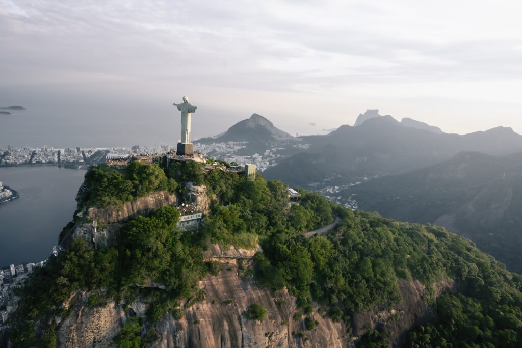 Aerial view of Christ the Redeemer Statue and Corcovado Mountain - Rio de Janeiro, Brazil, most iconic landmarks in the world