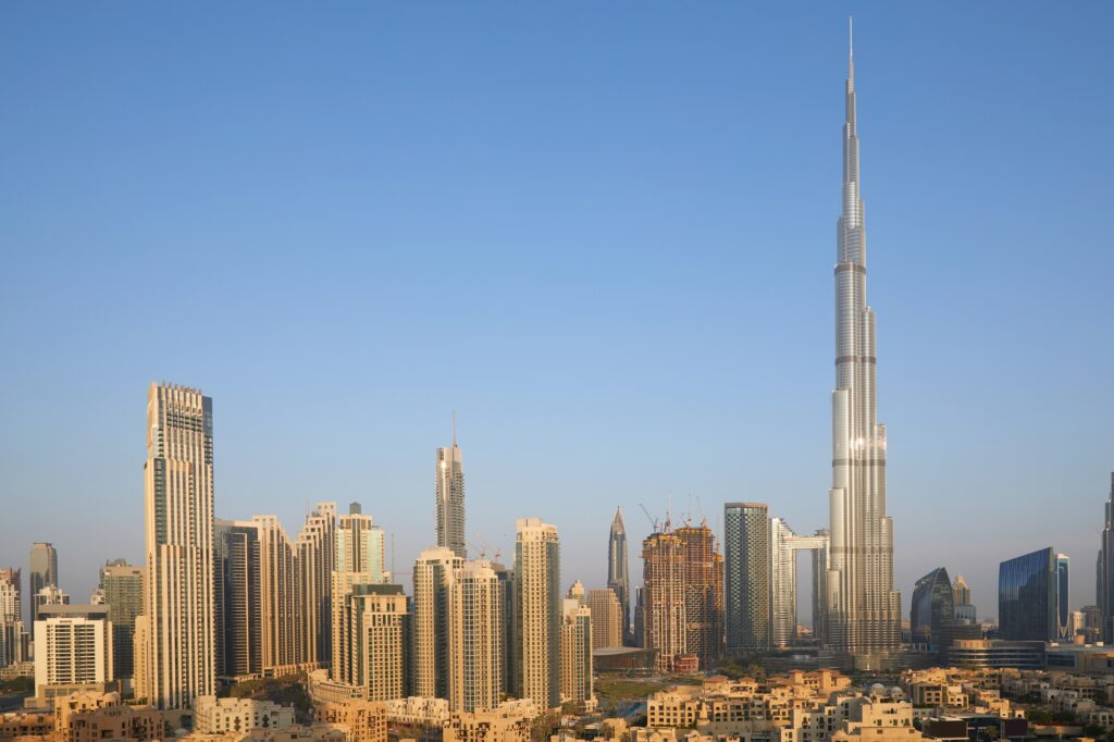 Burj Khalifa skyscraper and Dubai city view in a sunny morning, most iconic landmarks in the world