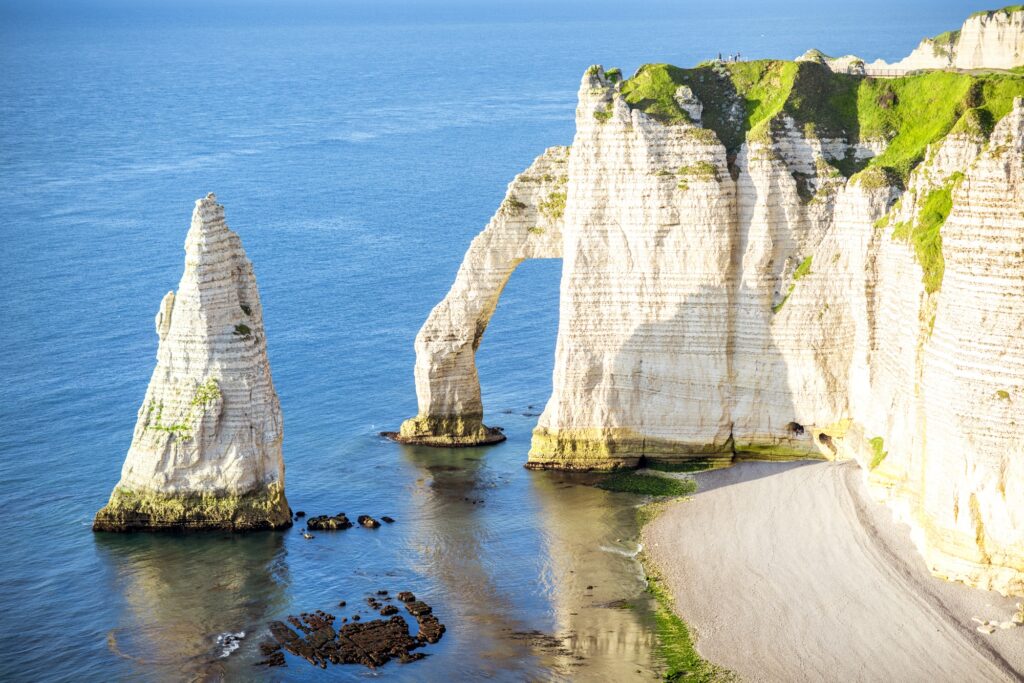 Landscape view on the rocky coastline in Etretat, best places to visit in France