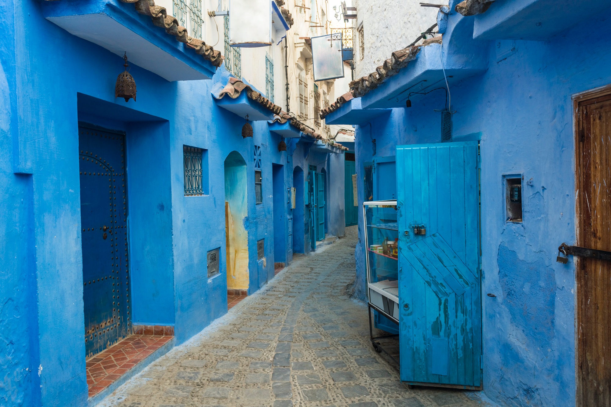 Morocco, Chefchaouen, Narrow alley and traditional blue houses