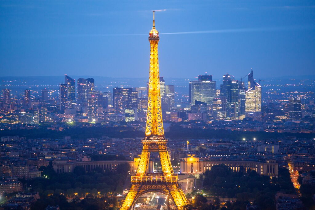 skyline of Paris with Eiffel Tower at sunset in Paris, France, most iconic landmarks in the world