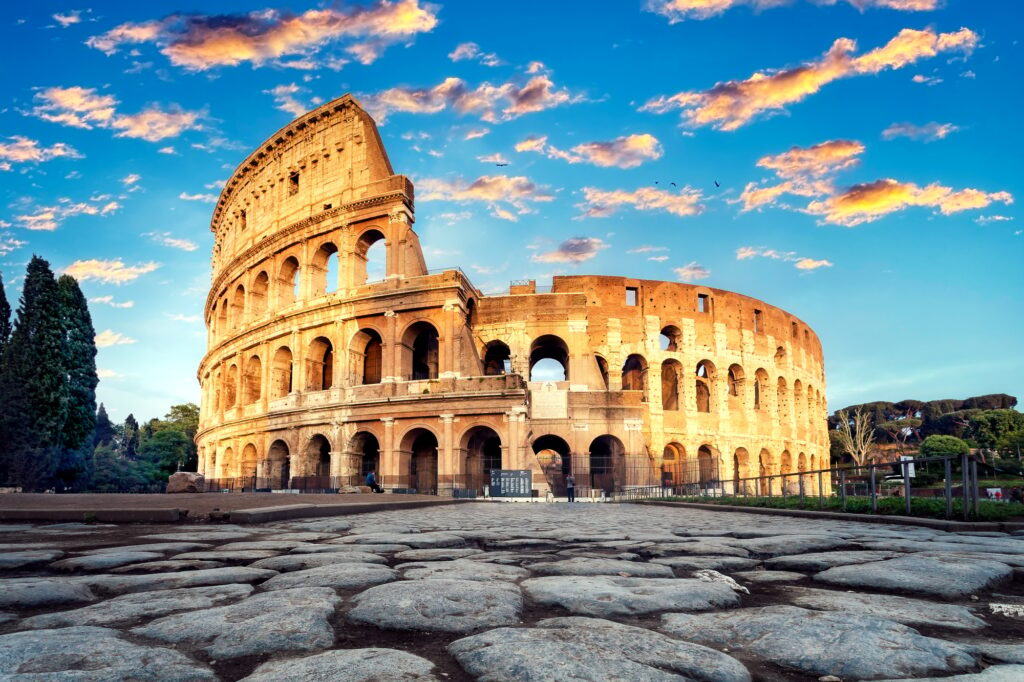 Sunset and Colosseum in Rome, Italy, most iconic landmarks in the world