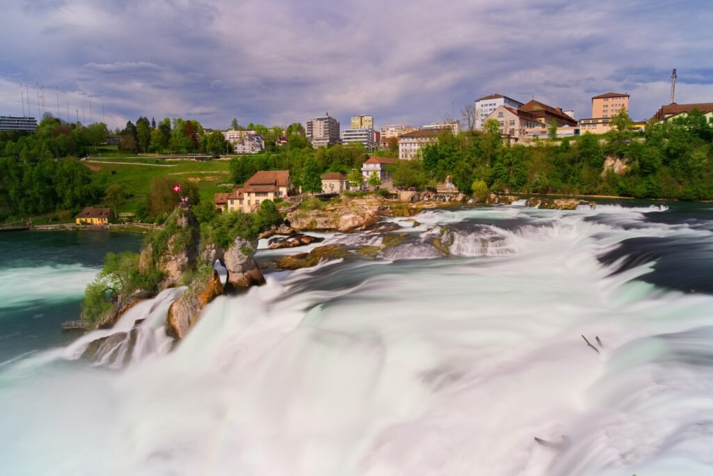 Smooth water flowing at Rheinfall waterfall at Schaffhausen, Switzerland, best places to visit in Switzerland