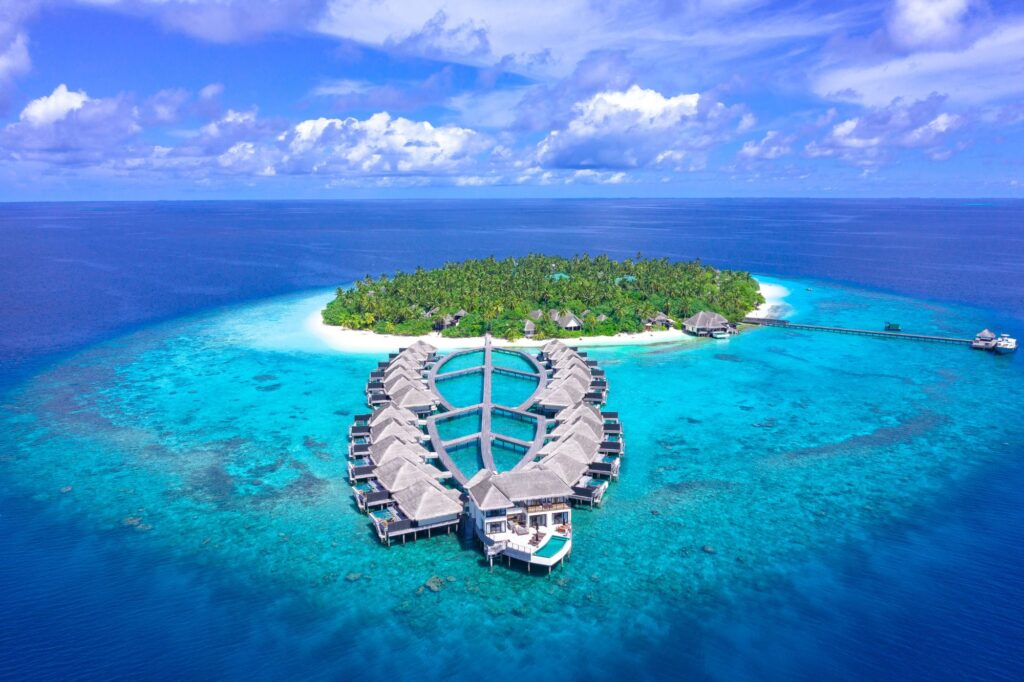 Aerial view of the Maldives with overwater villas.  