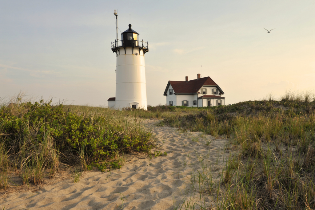 lighthouse and beach house in Cape Cod, MA