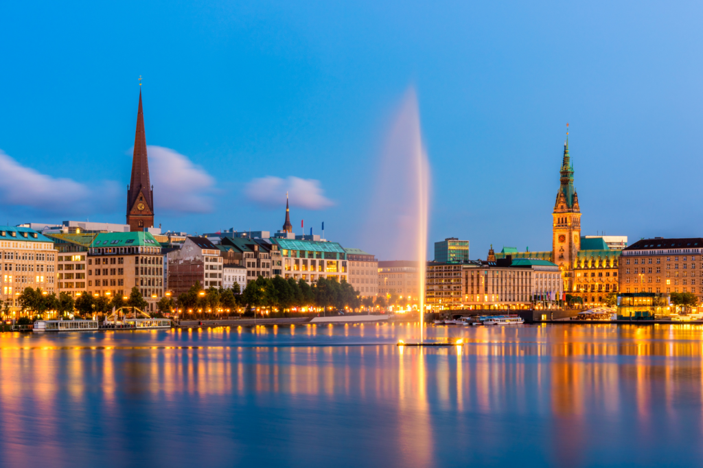 Hamburg, Germany in the evening with the city skyline.